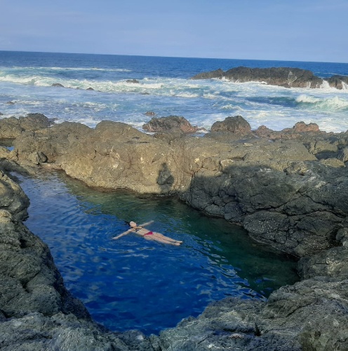 woman swimming in the montezuma tide pool